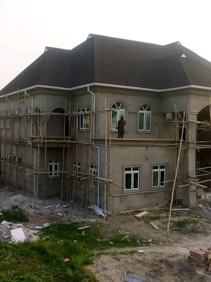 Two-storey residence roofed with premium dark stone-coated tiles
