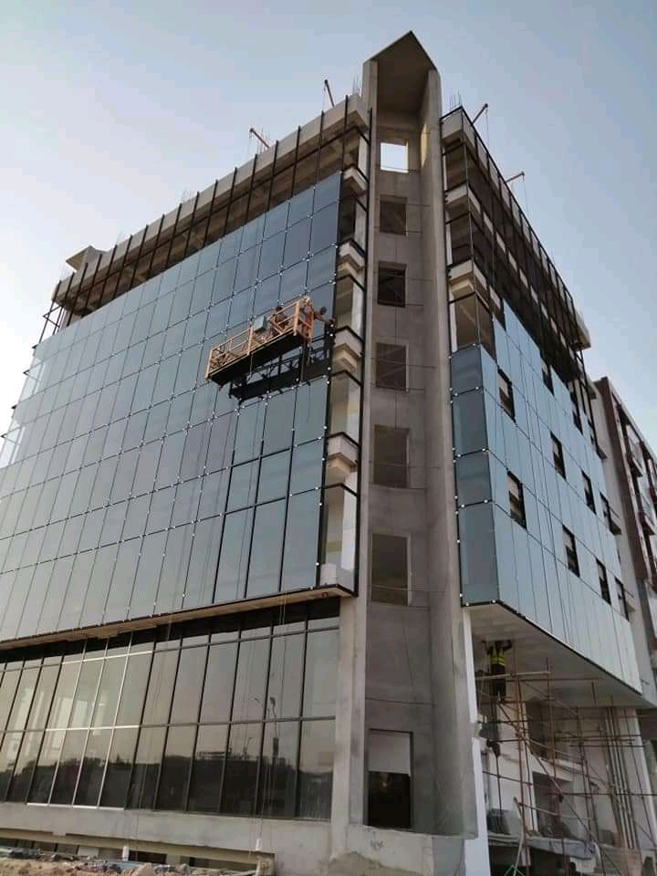 Commercial building with aluminium curtain wall glass facade